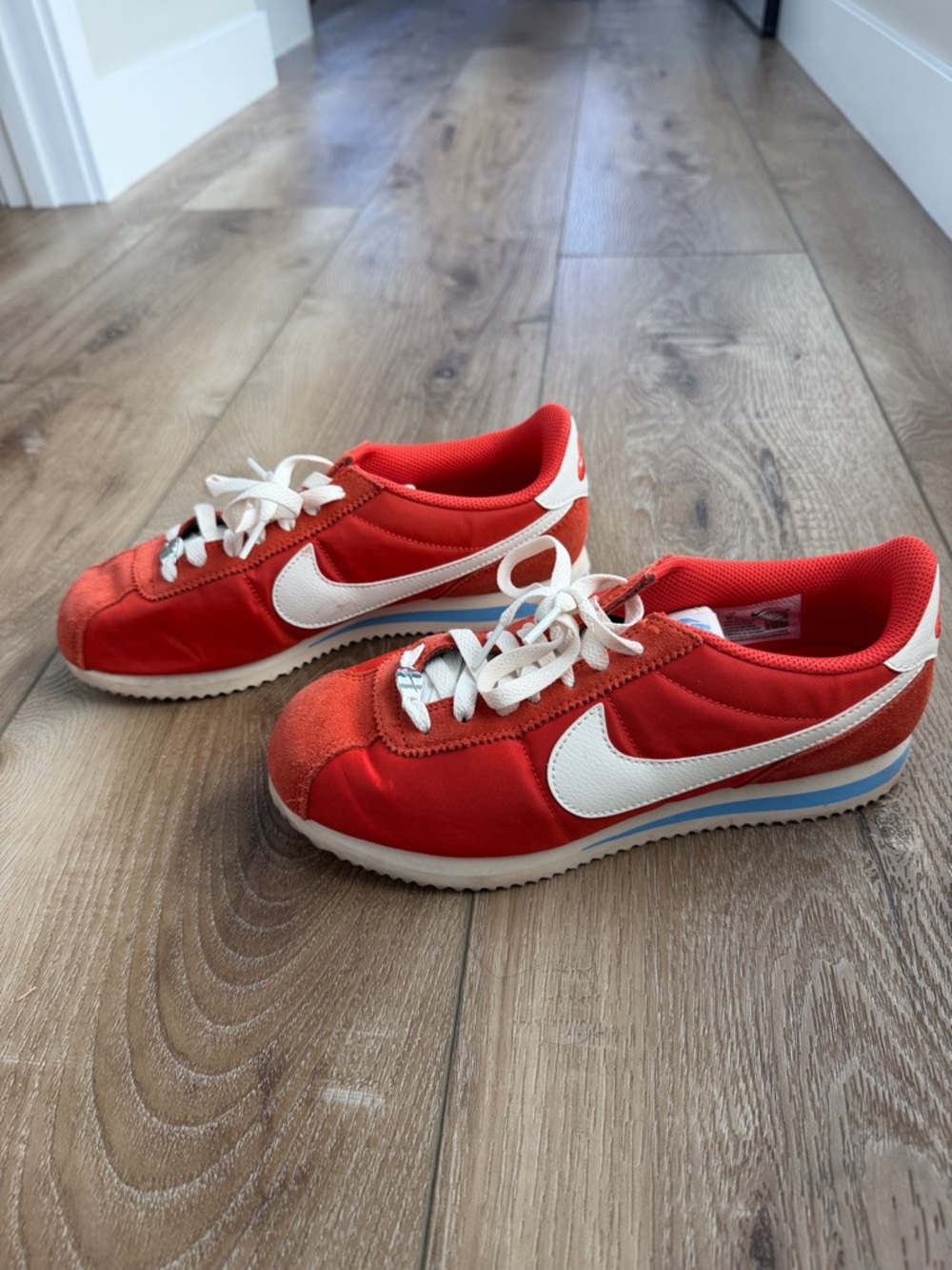 Nike women’s Cortez  Red and White and hint of blue Retro Sneakers
